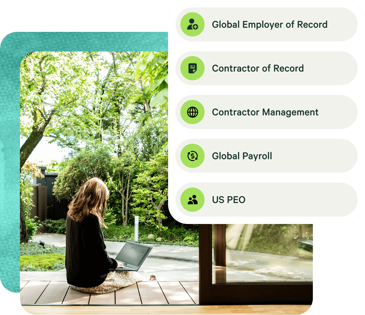 person sitting at the balcony with a laptop